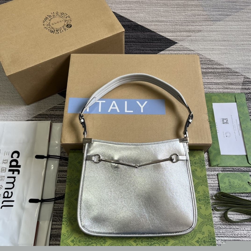 G*u*i top handle bags